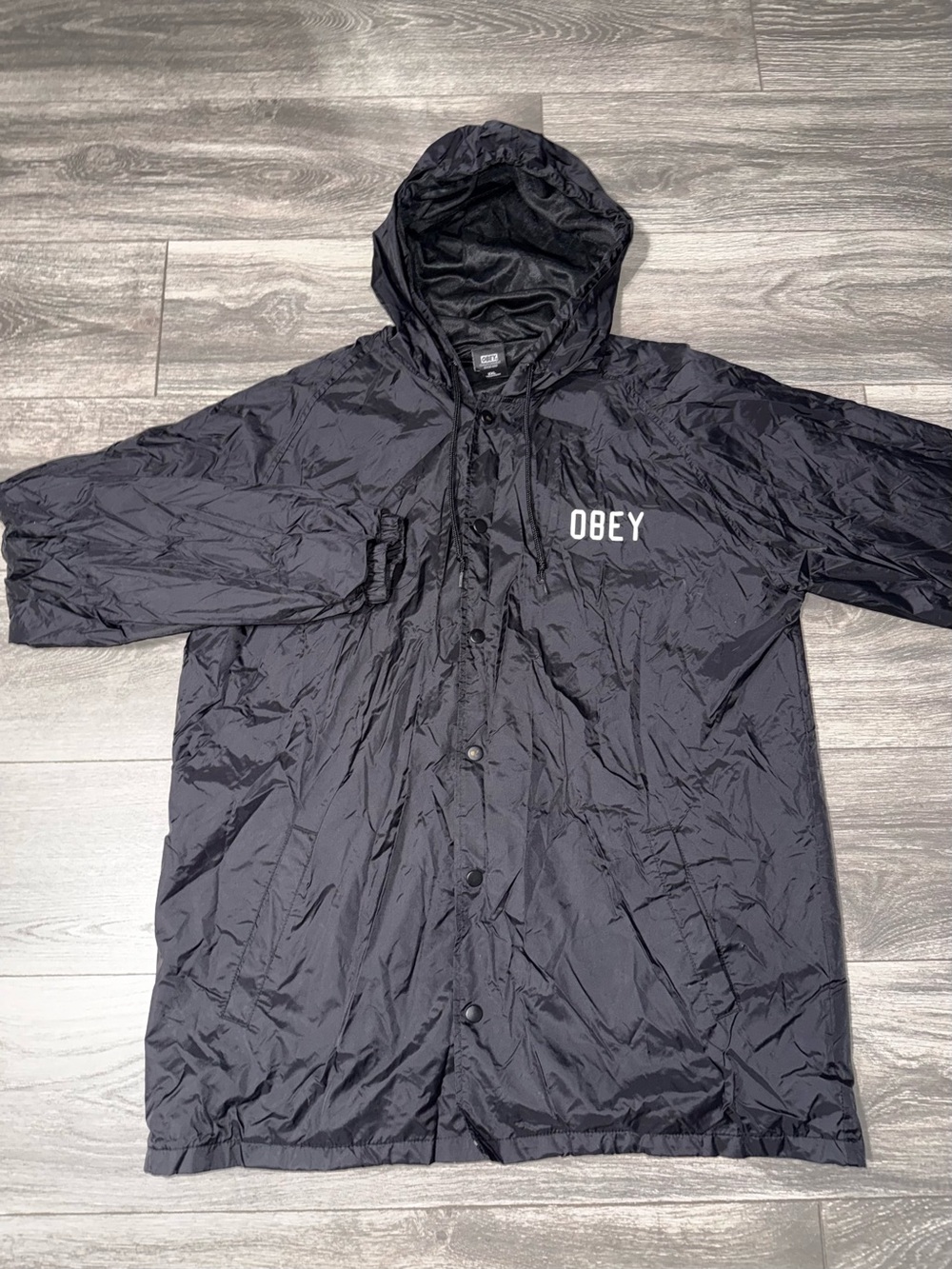 OBEY Black Hooded Windbreaker with Front Snap Closure